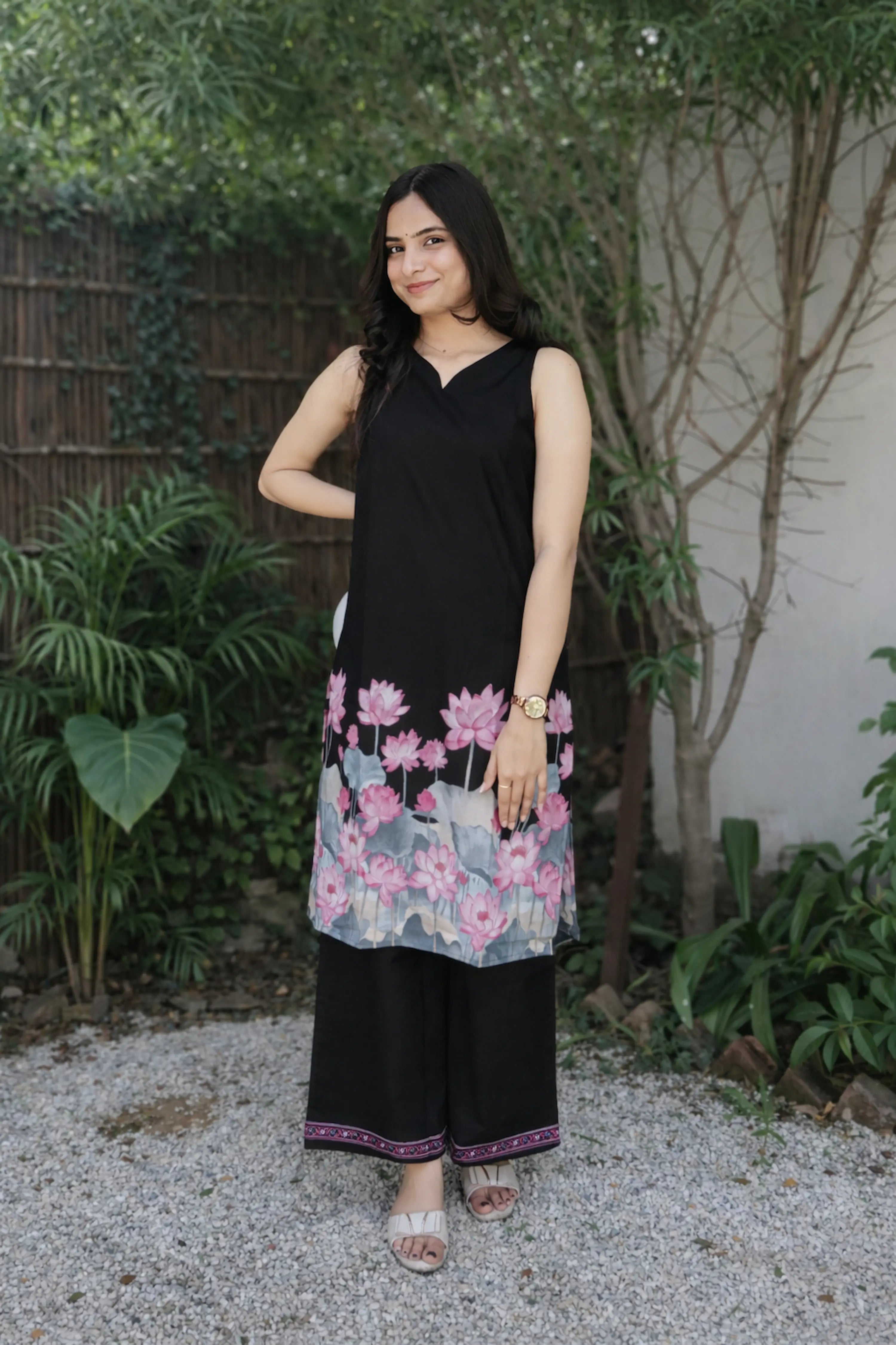 Black Sleeveless Kurta Set for Women with Pink Floral Border Print