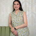 Green & Yellow Floral Print Sleeveless Peplum Top
